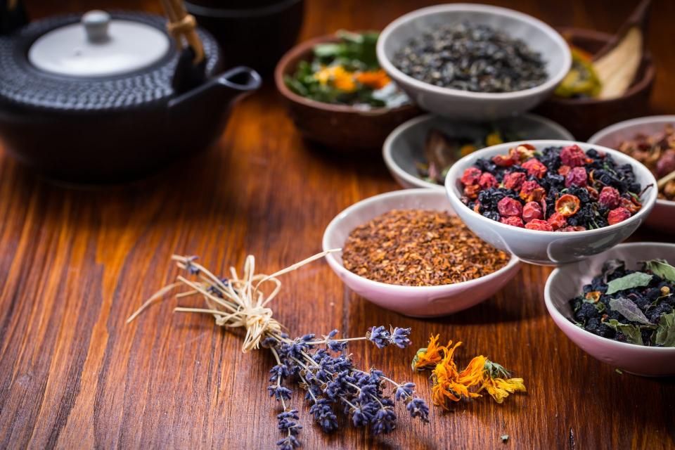 Various loose teas and herbs displayed beautifully.
